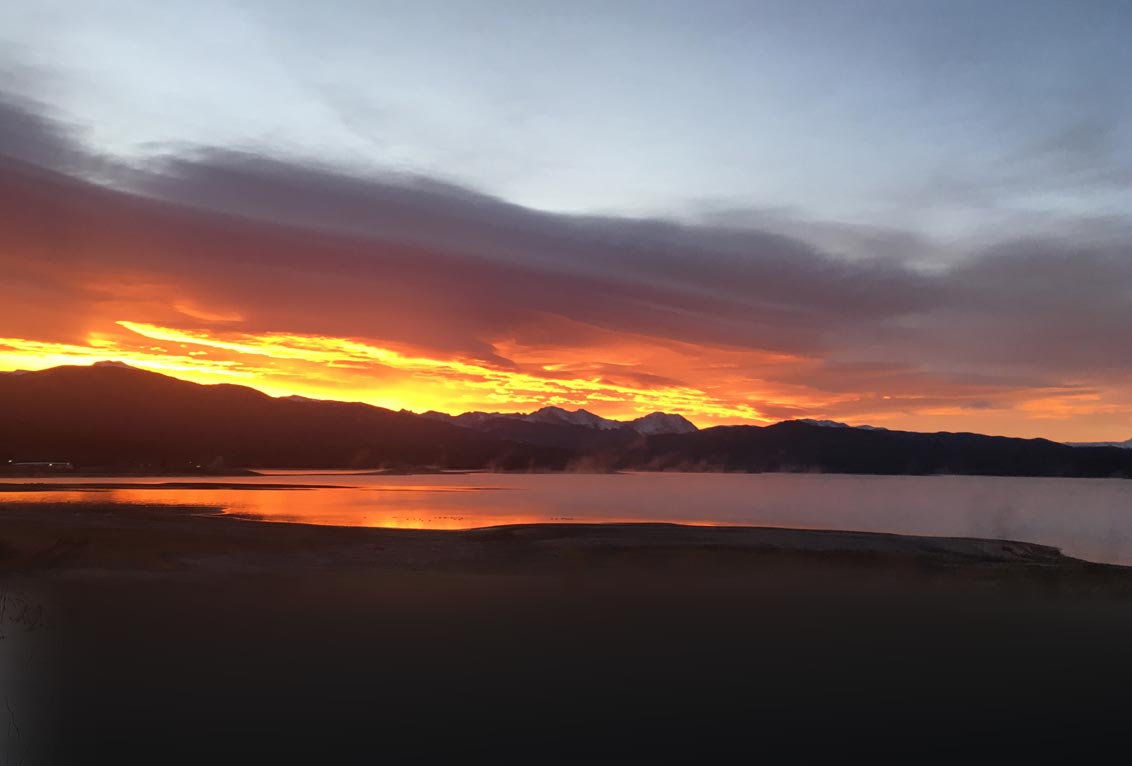 Beautiful sunset over the mountains - Grand County, Colorado real estate services